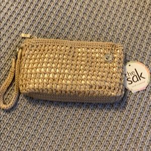 The Sak Tan and Gold woven clutch/wristlet